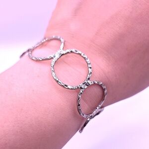 Elegant Silvertone Infinity Circle Cuff Bracelet